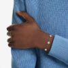 Een Angelic-armband met ronde slijpvorm, dubbelzijdige motieven, wit, gerhodineerd Een Angelic-armband met ronde slijpvorm, dubbelzijdige motieven, wit, gerhodineerd