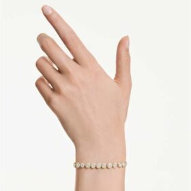 Een Angelic-armband met ronde slijpvorm, wit, verguld