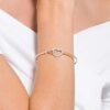 Hyperbola-armband met Infinity-teken en hart, wit, gemengde metaalafwerking Hyperbola-armband met Infinity-teken en hart, wit, gemengde metaalafwerking