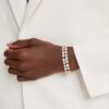 Mesmera-armband met gemengde slijpvormen, wit, verguld Mesmera-armband met gemengde slijpvormen, wit, verguld