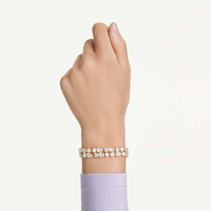 Mesmera-armband met gemengde slijpvormen, wit, verguld Mesmera-armband met gemengde slijpvormen, wit, verguld