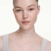 Una Angelic-ketting met ronde slijpvorm, dubbelzijdige motieven, wit, gerhodineerd Una Angelic-ketting met ronde slijpvorm, dubbelzijdige motieven, wit, gerhodineerd